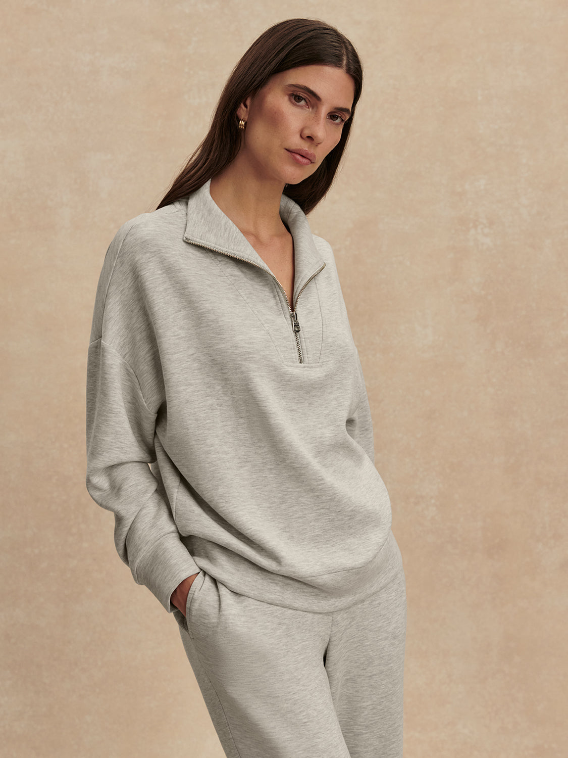 light grey marl half zip sweatshirt from varley model shot