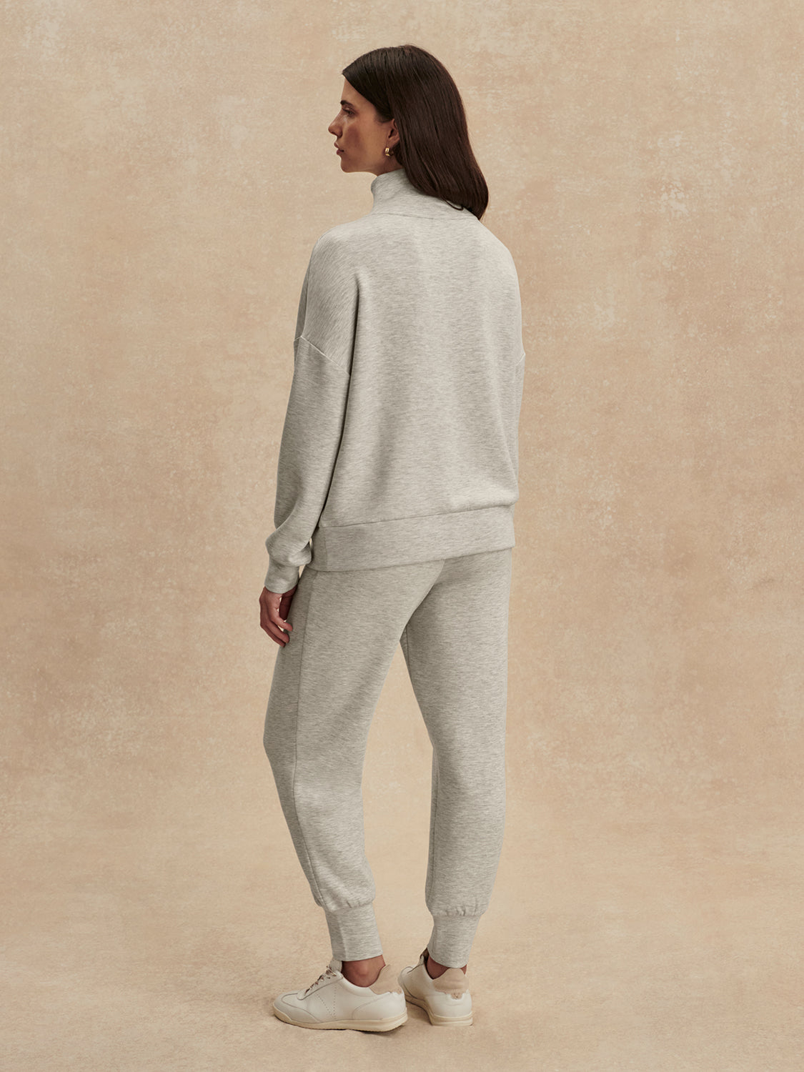 light grey marl half zip sweatshirt from varley rear view