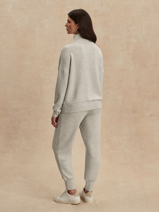light grey marl half zip sweatshirt from varley rear view