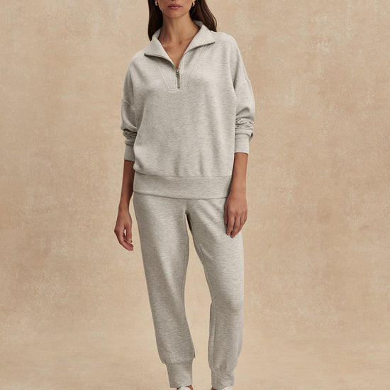 light grey marl half zip sweatshirt from varley model shot