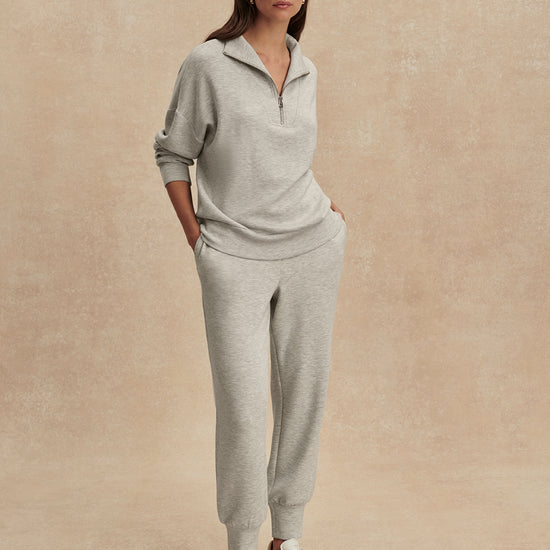 light grey marl half zip sweatshirt from varley model shot