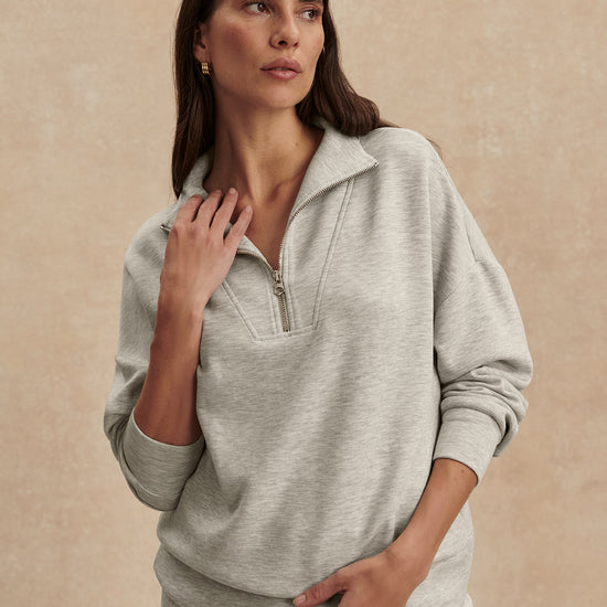 light grey marl half zip sweatshirt from varley model shot