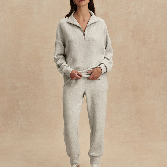 light grey marl half zip sweatshirt from varley model shot