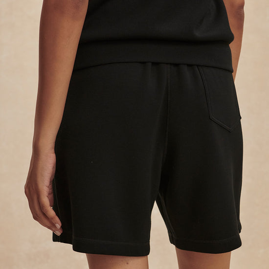 high rise black shorts with drawstring waist from varley rear view