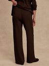 wide leg sweat pants with elasticated waist and piping in the middle down the leg from varley rear view