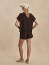 short sleeve chocolate brown sweatshirt with half zip from varley rear view