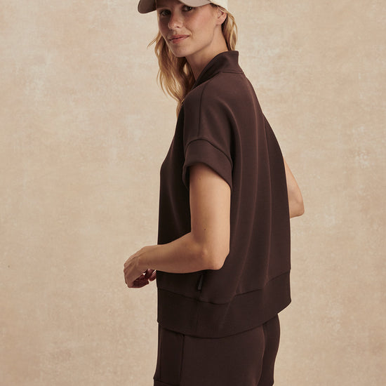 short sleeve chocolate brown sweatshirt with half zip from varley side view