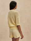 v neck crochet knit short sleeve pale yellow jumper from varley rear view