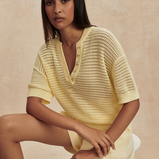 v neck crochet knit short sleeve pale yellow jumper from varley model shot