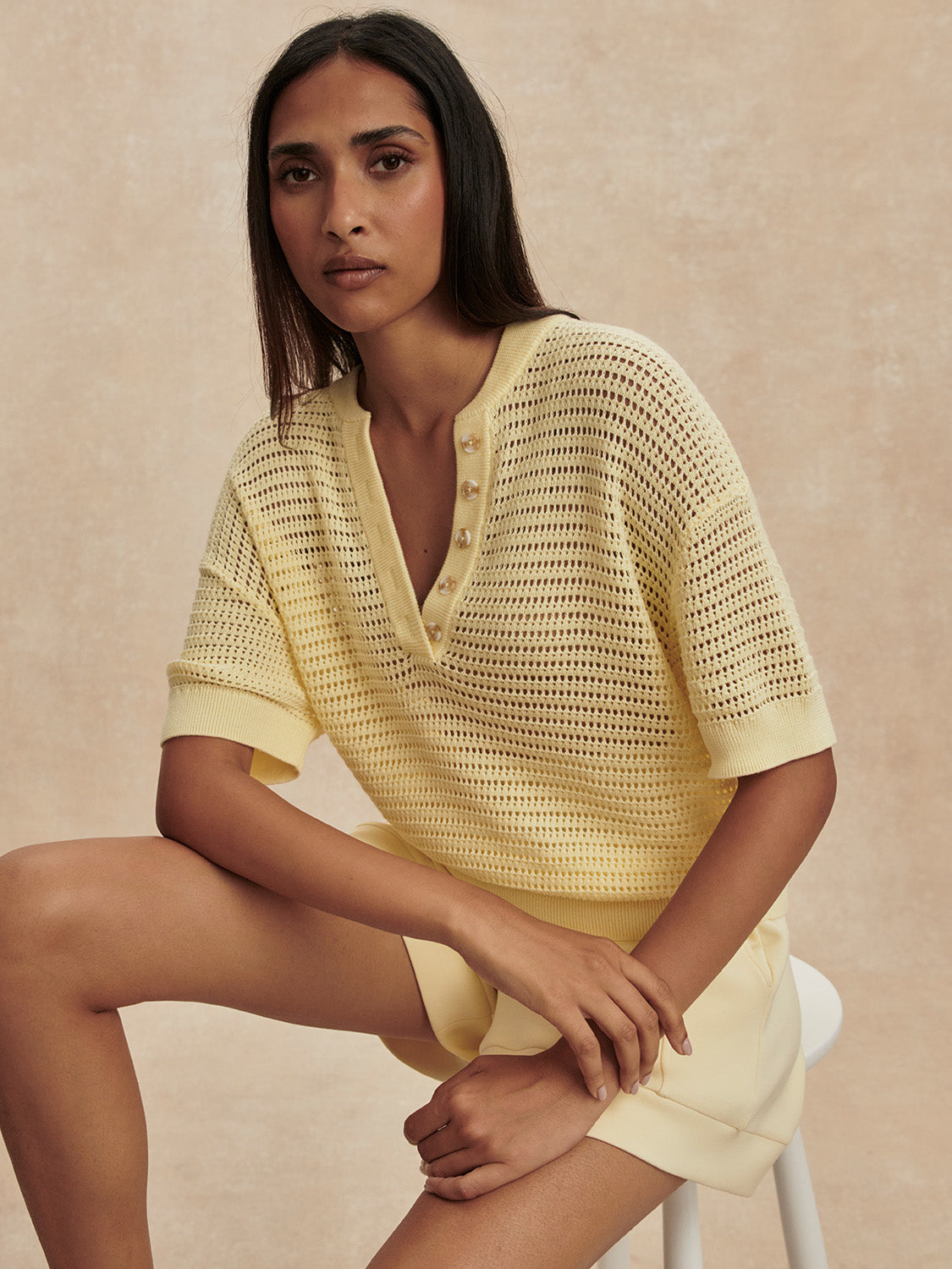 v neck crochet knit short sleeve pale yellow jumper from varley model shot