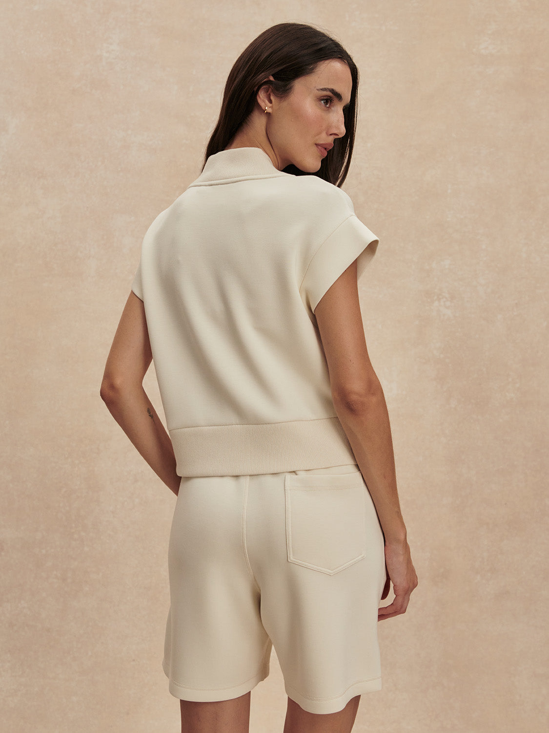 v neck short sleeve beige sweat from varley rear view