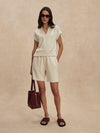 wide leg soft shorts beige with drawstring waistband from varley model shot