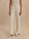 wide leg ivory sweat pants with piping down the centre from varley 