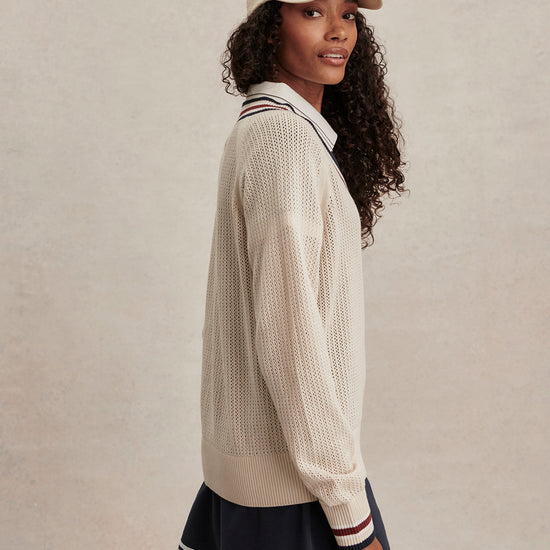 v neck cricket style knitted jumper in beige from varley side view