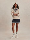 v neck cricket style knitted jumper in beige from varley model shot