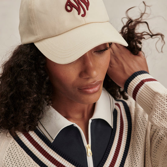 v neck cricket style knitted jumper in beige from varley close up