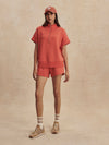 short sleeve coral half zip sweatshirt with high neck from varley model shot