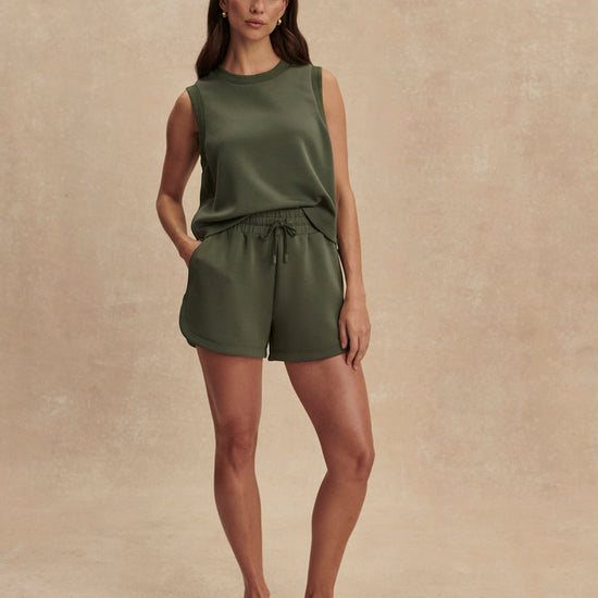 khaki green drawstring waistband short from varley model shot
