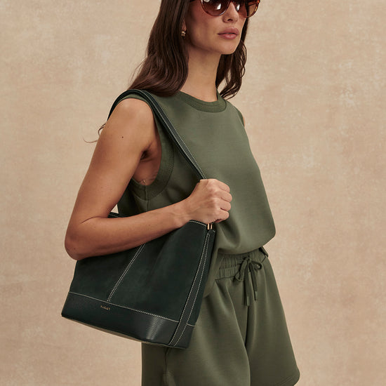 khaki green drawstring waistband short from varley side view