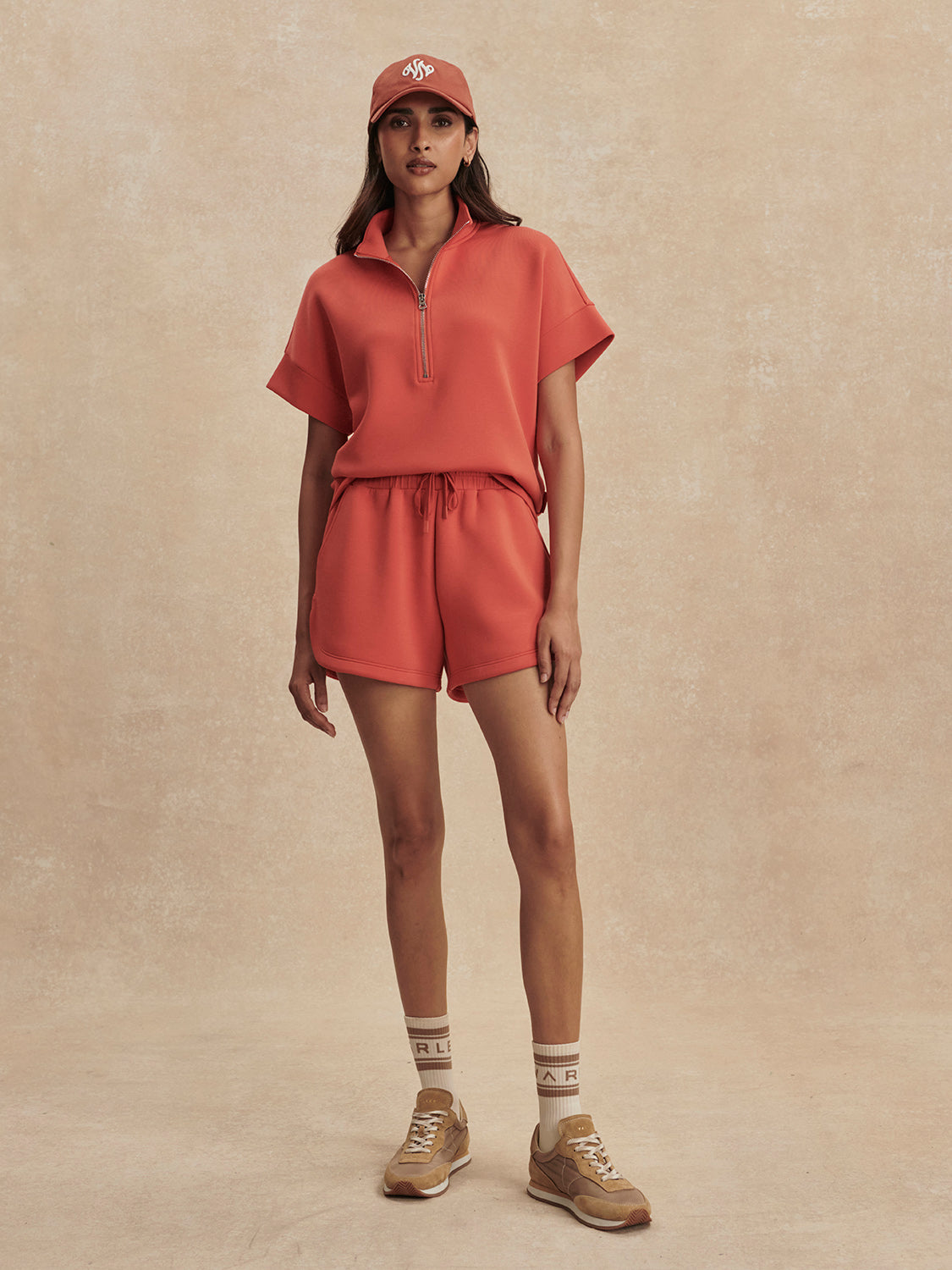 coral sweat pant shorts with drawstring waist from varley model shot