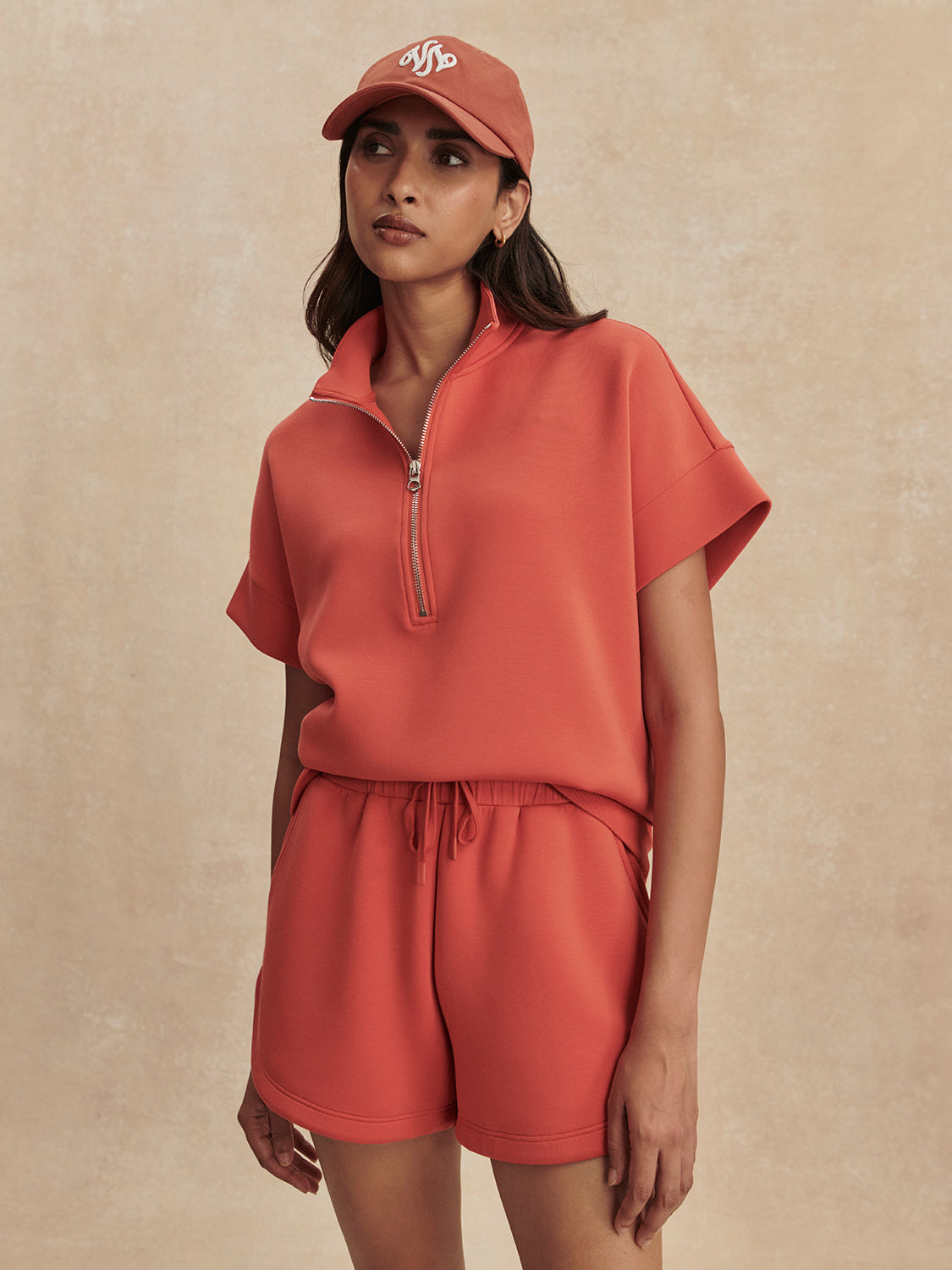 coral sweat pant shorts with drawstring waist from varley model shot