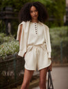 beige sweat pant shorts with drawstring waist from varley model shot