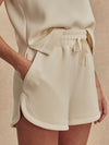 beige sweat pant shorts with drawstring waist from varley side view