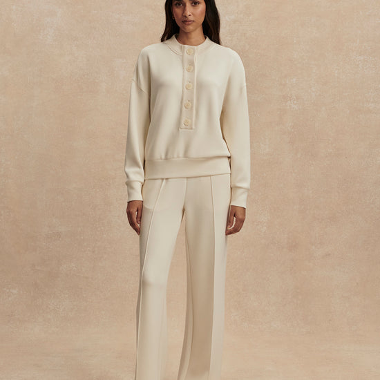 round neck 3/4 placket button down sweatshirt in ivory from varley model shot