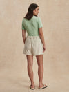 ivory chino style tailored shorts with double buttons and pleat detailing from varley rear view