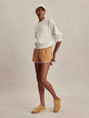 round neck ivory sweatshirt with piping down the centre from varley model shot