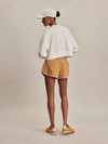 round neck ivory sweatshirt with piping down the centre from varley rear view