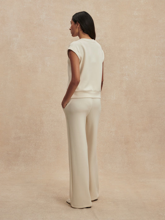 wide leg ivory sweat pants with central piping seam and elasticated waist from varley rear view