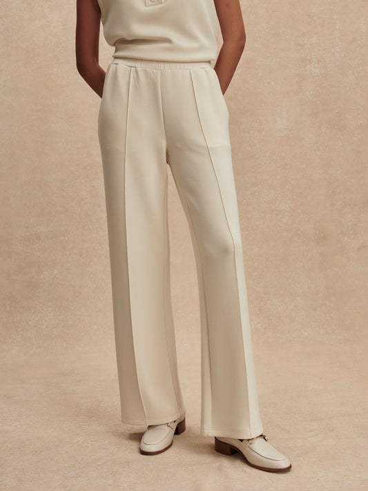 wide leg ivory sweat pants with central piping seam and elasticated waist from varley