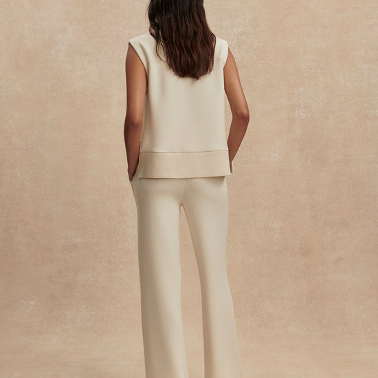 wide leg ivory sweat pants with central piping seam and elasticated waist from varley rear view