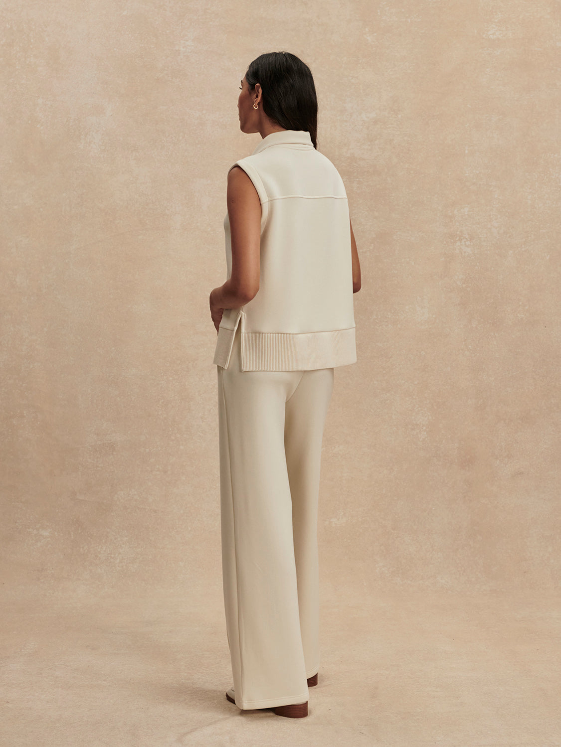 wide leg ivory sweat pants with central piping seam and elasticated waist from varley rear view