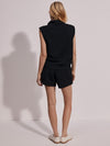 wide leg black sweatpant shorts with piping and drawstring waistband from varley rear view