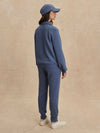 blue sweatshirt with collar and half zip from varley rear view