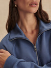 blue sweatshirt with collar and half zip from varley close up
