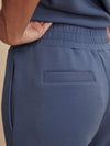 blue slim cuff sweat pants with elasticated waistband from varley close up of rear view