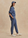 blue slim cuff sweat pants with elasticated waistband from varley side view