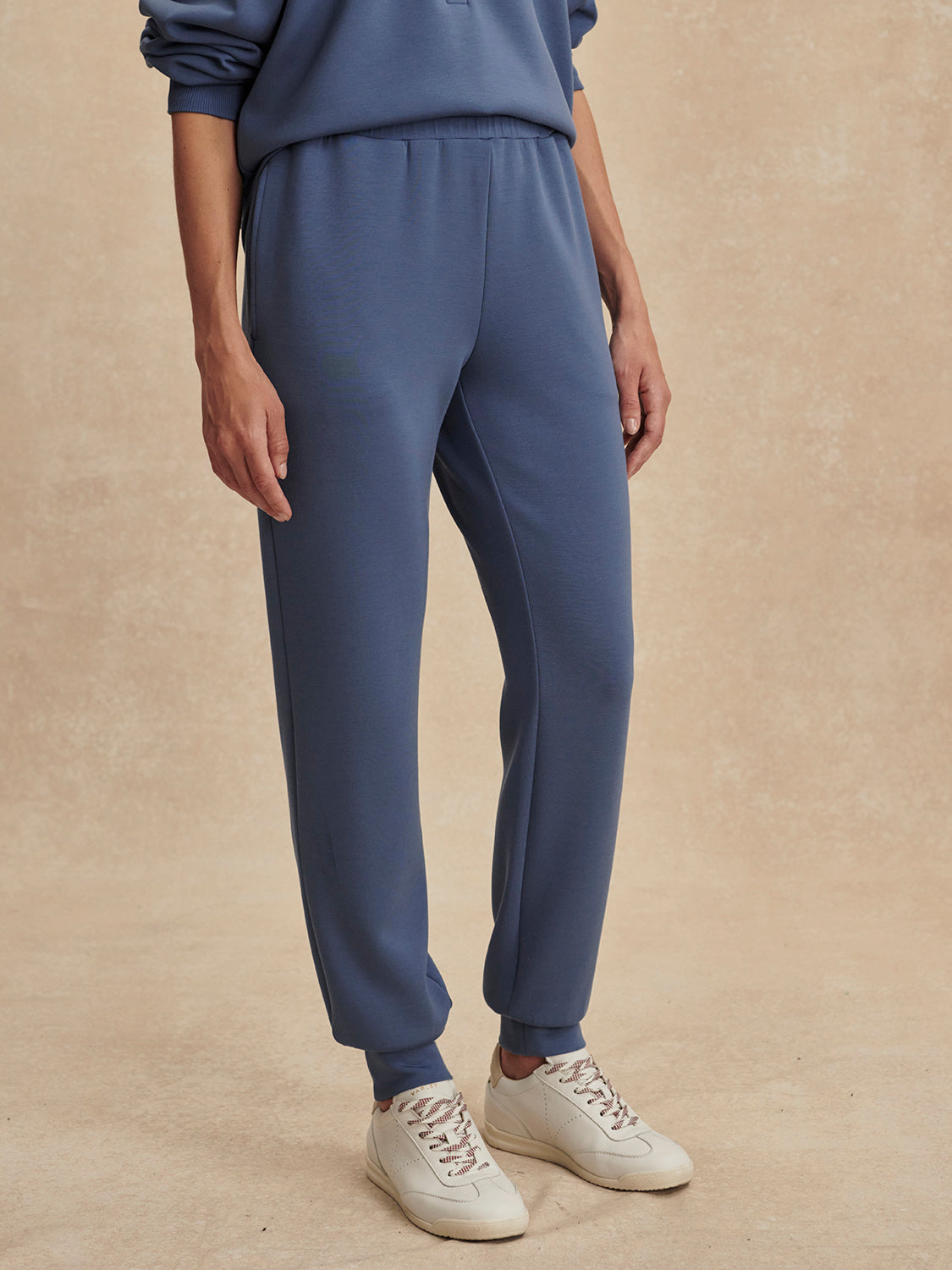 blue slim cuff sweat pants with elasticated waistband from varley