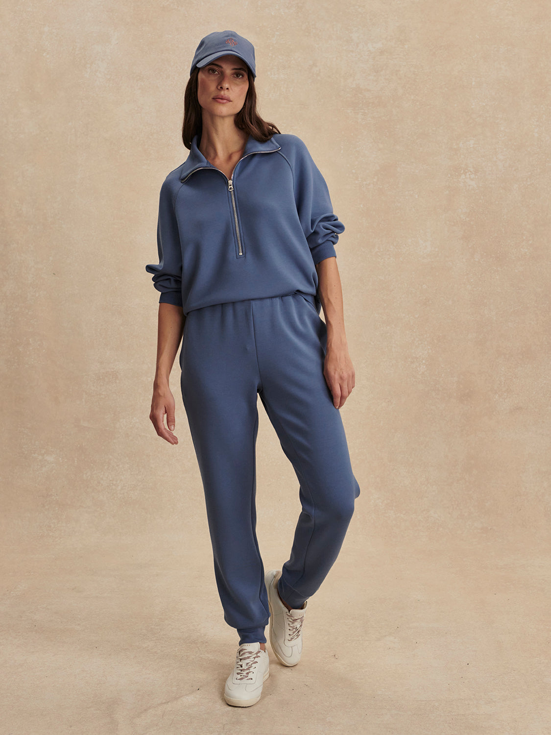 blue slim cuff sweat pants with elasticated waistband from varley model shot