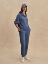 blue slim cuff sweat pants with elasticated waistband from varley model shot