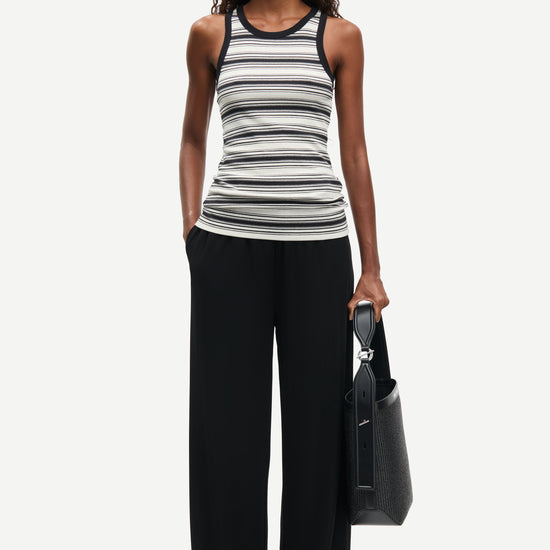 slight racerback tank top with black and white stripes from samsoe  model shot