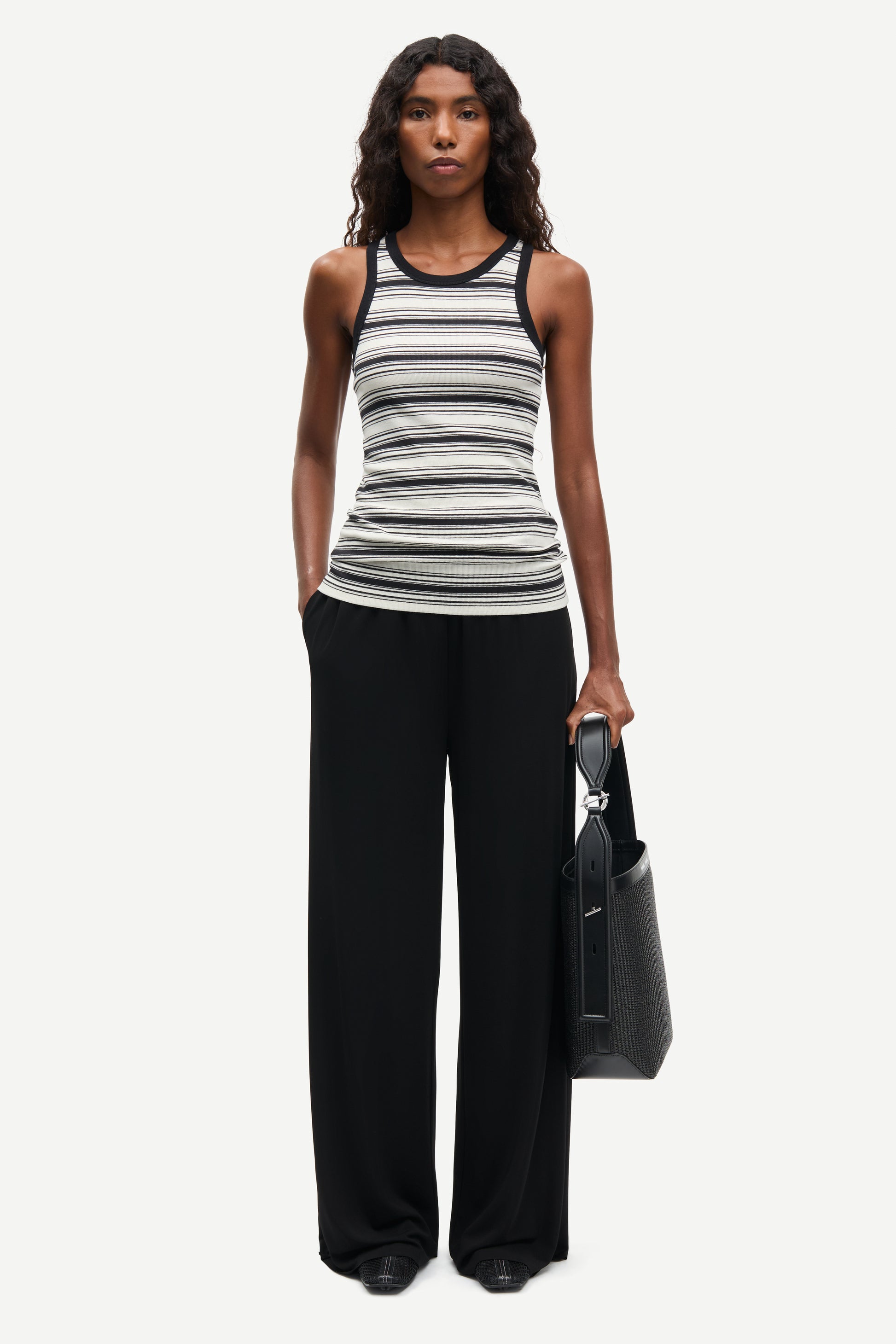 slight racerback tank top with black and white stripes from samsoe  model shot