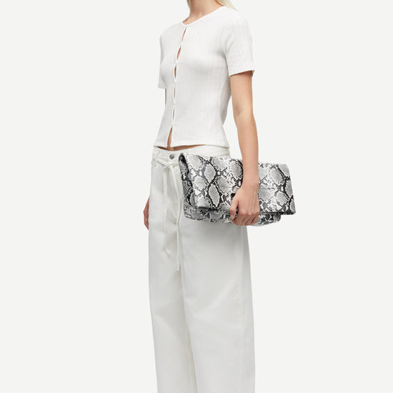 round neck short sleeve cotton white cardigan with small white buttons from samsoe side view