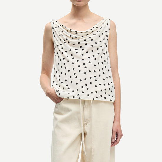 white cowl neck polka dot sleeveless top from samsoe model shot