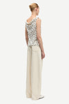 white cowl neck polka dot sleeveless top from samsoe rear view