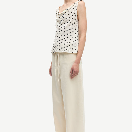 white cowl neck polka dot sleeveless top from samsoe model shot