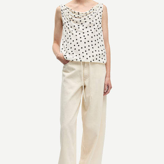 white cowl neck polka dot sleeveless top from samsoe model shot